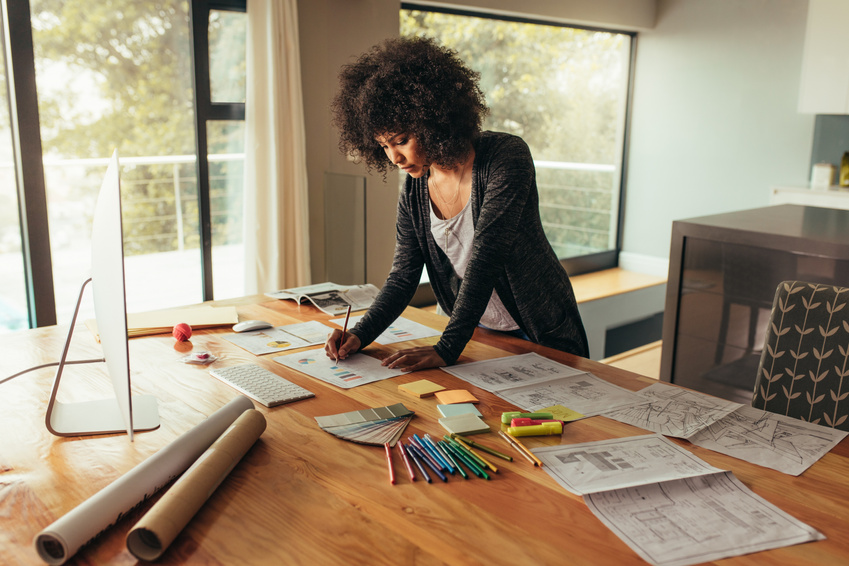 Young African Businesswoman Working on Project